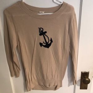 Cream sweater with navy anchor on front